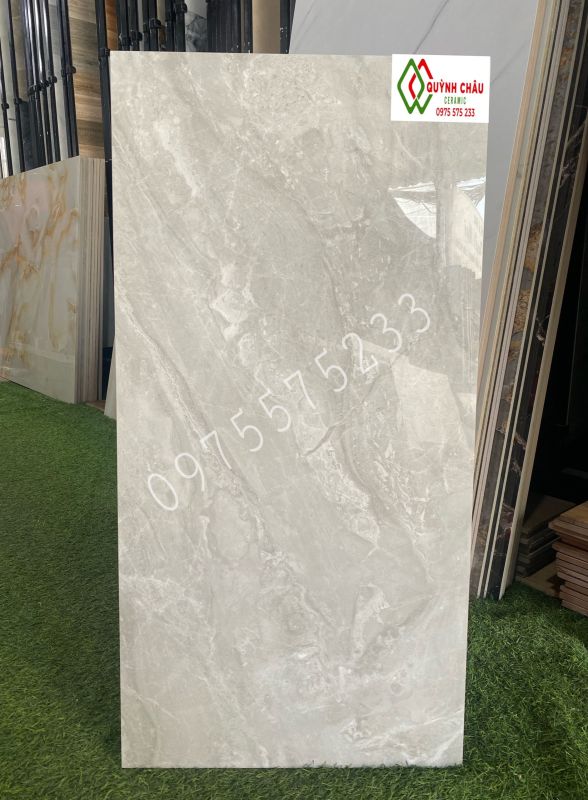 Đá ốp tường 40x80 bóng kiếng xám vân đá đồng chất