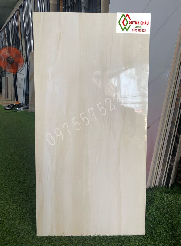Đá ốp tường 40x80 màu kem bóng kiếng đồng chất
