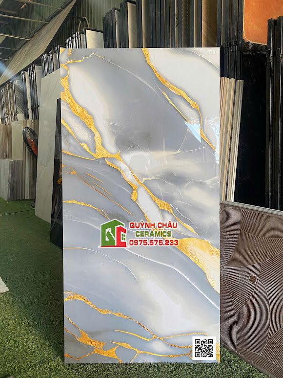 Gạch 60x120 vân đá marble xám vàng bóng kính