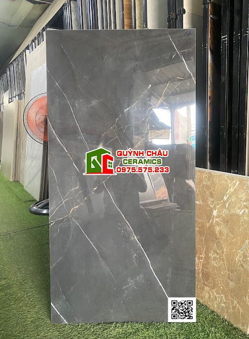 Gạch 60x120 xám đen vân xen trắng điểm vàng Albert black bóng kiếng