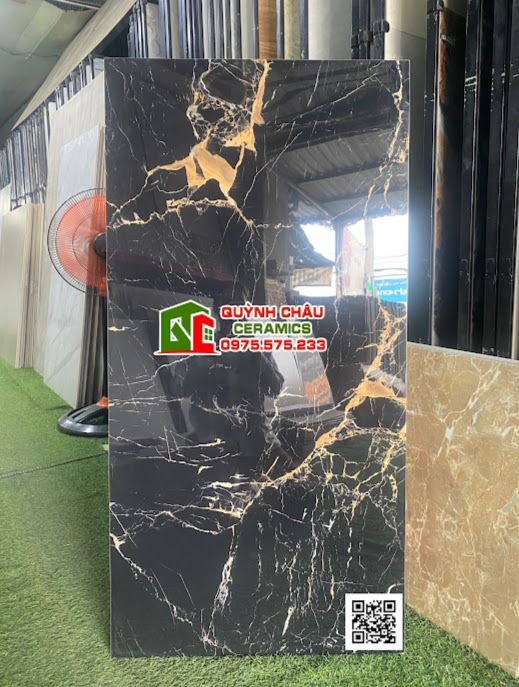 Gạch ốp lát 60x120 đen vân đá vàng Golden black bóng kiếng