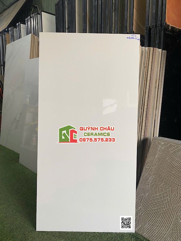 Gạch ốp lát CMC 60x120 men trắng trơn bóng kính             