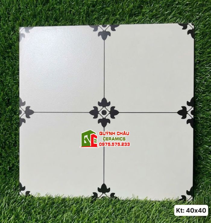 Mẫu gạch bông hoa văn đen đối xứng nền trắng 40x40cm