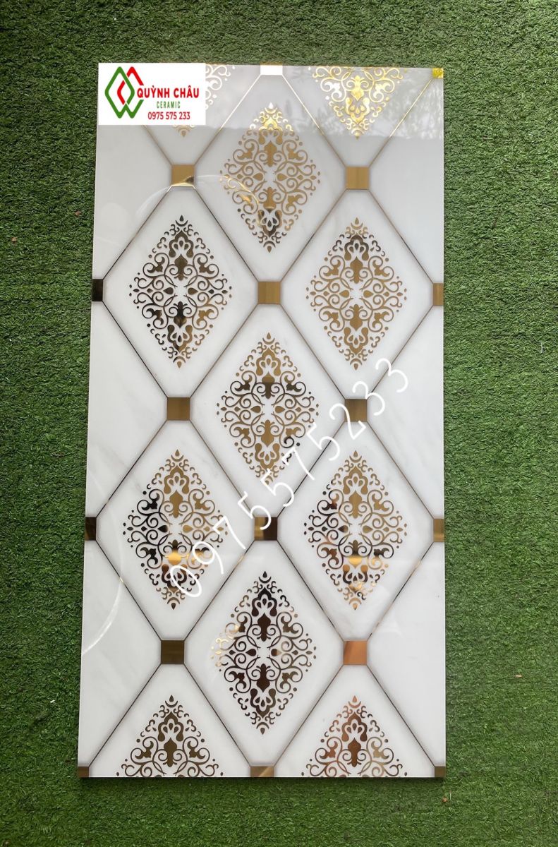 Gạch bóng kiếng 30x60 khắc kim nhũ vàng