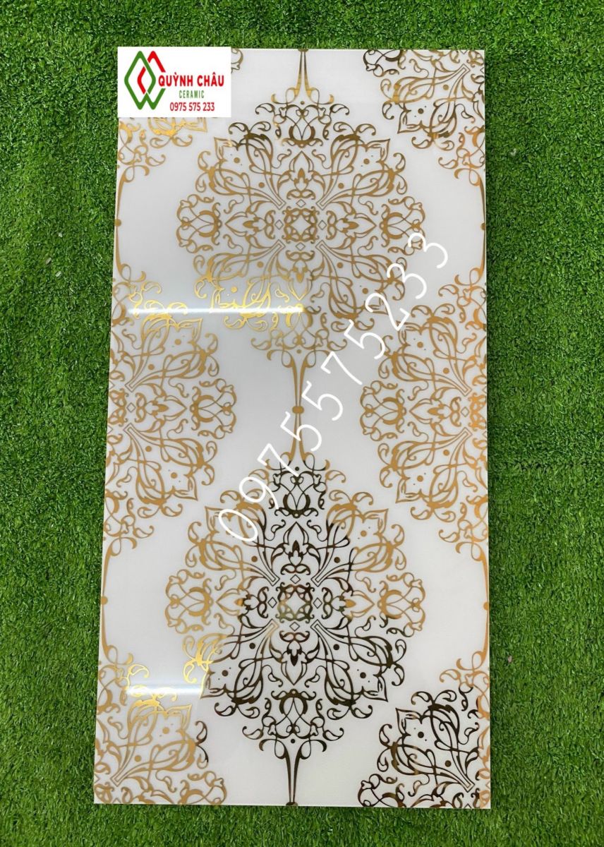 Đá bóng kính 30x60 nhũ vàng khắc kim