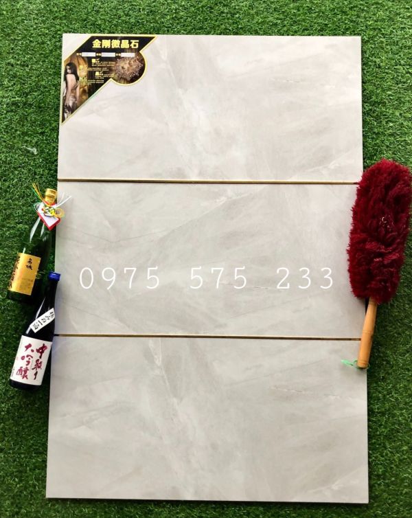 Mẫu gạch 40x80 ốp tường vân đá xám bóng kiếng cao cấp