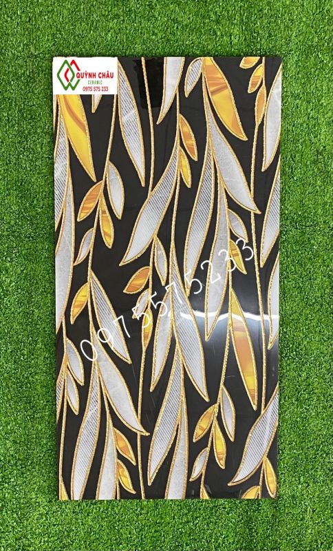 Gạch ốp tường hình lá cây khắc kim nhũ vàng 30x60 đẹp ts