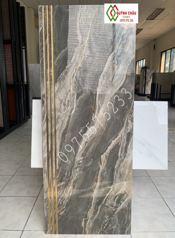 Gạch lát cầu thang 47x120 màu vân đá xám khắc kim vàng