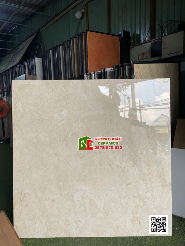 Gạch lát phòng khách 120x120cm vàng Beige vân đá bóng kiếng