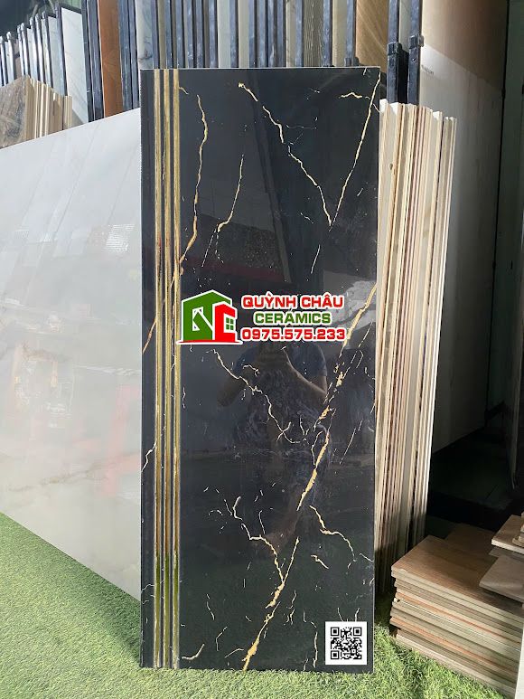 Gạch lát tam cấp cầu thang 47x120 đen vân nhũ vàng Gạch lát tam cấp cầu thang 47x120 đen vân nhũ vàng