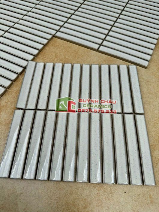 Gạch mosaic thanh que đũa lõm chấm mè Gạch mosaic thanh que đũa lõm chấm mè