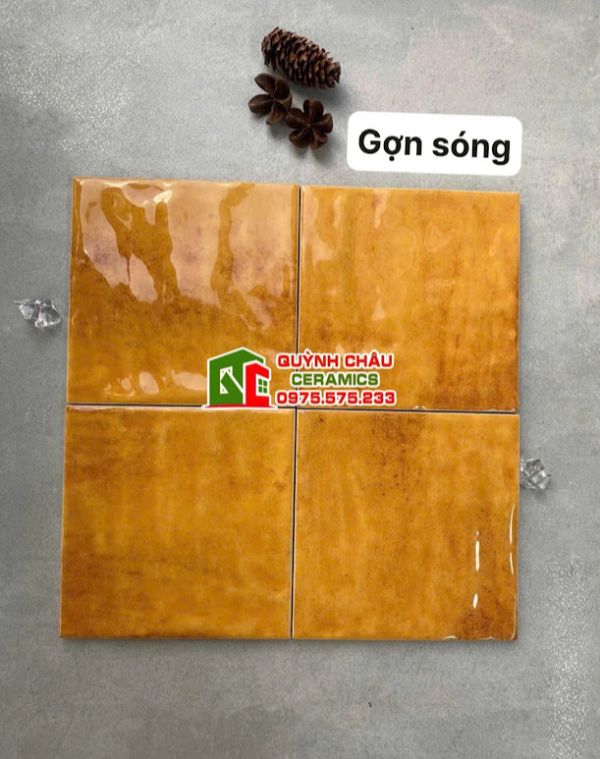 Gạch thẻ vàng bóng hiệu ứng lượn sóng 12x12 vuông Gạch thẻ vàng bóng hiệu ứng lượn sóng 12x12 vuông